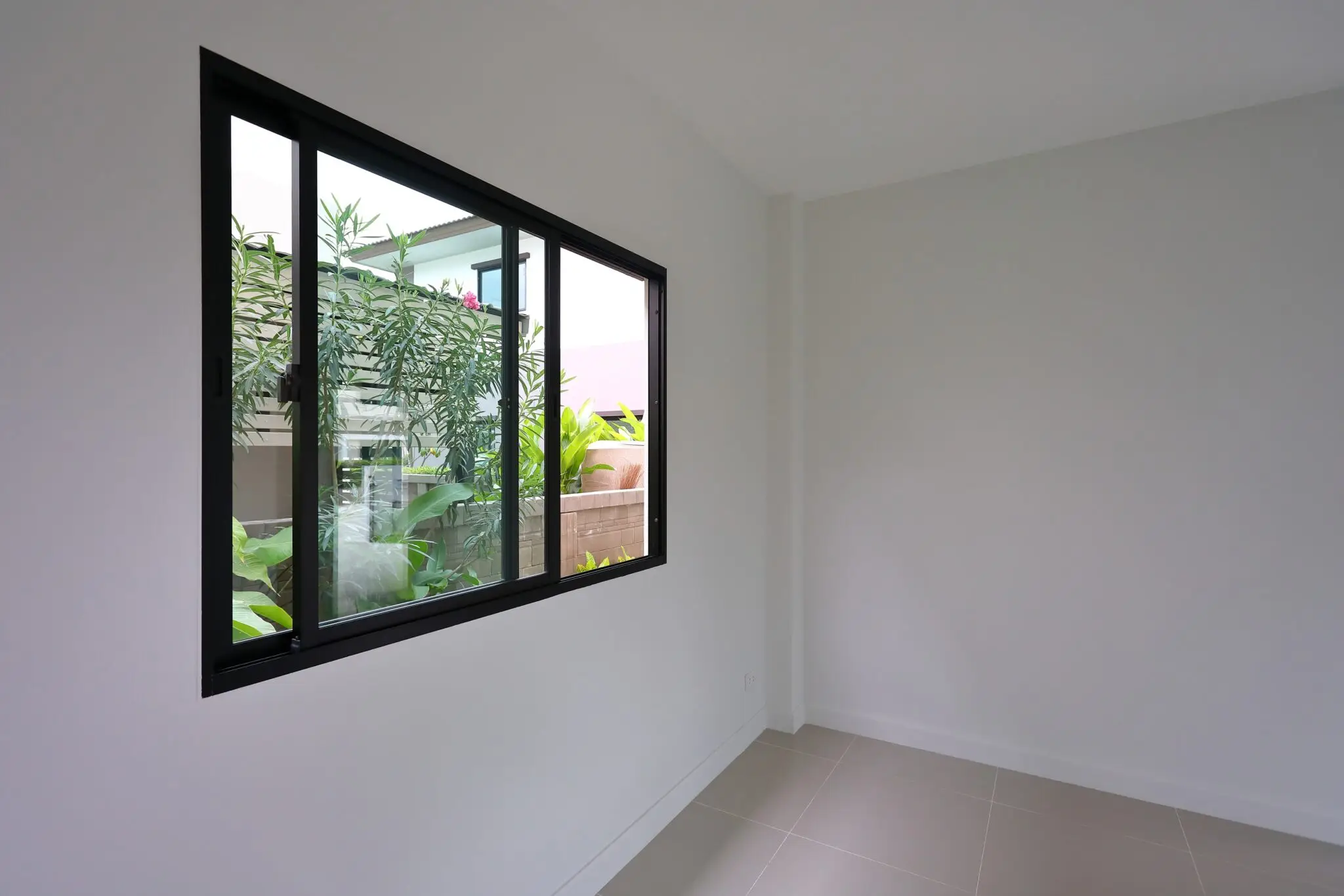 Horizontal sliding windows on a modern home