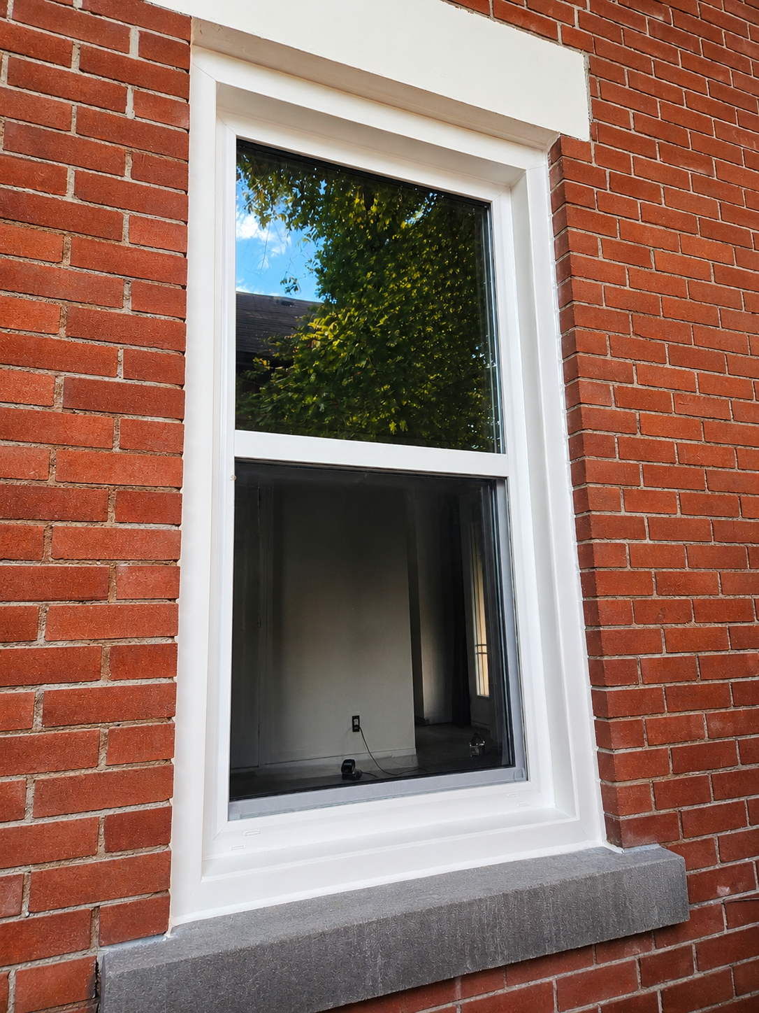 Bright casement window overlooking a garden